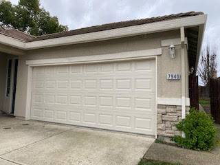 Garage door service technician on site